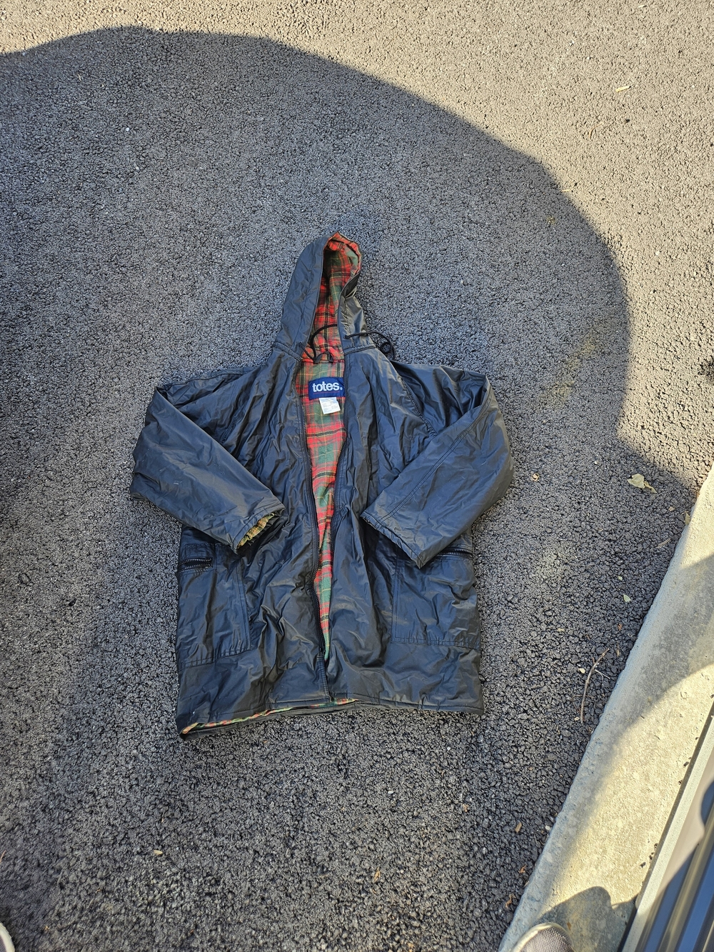 totes Black Hooded Raincoat with Red-Green Plaid Lining
